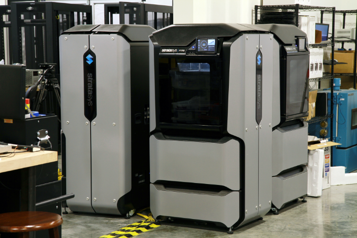 A Stratasys 3D printer. 