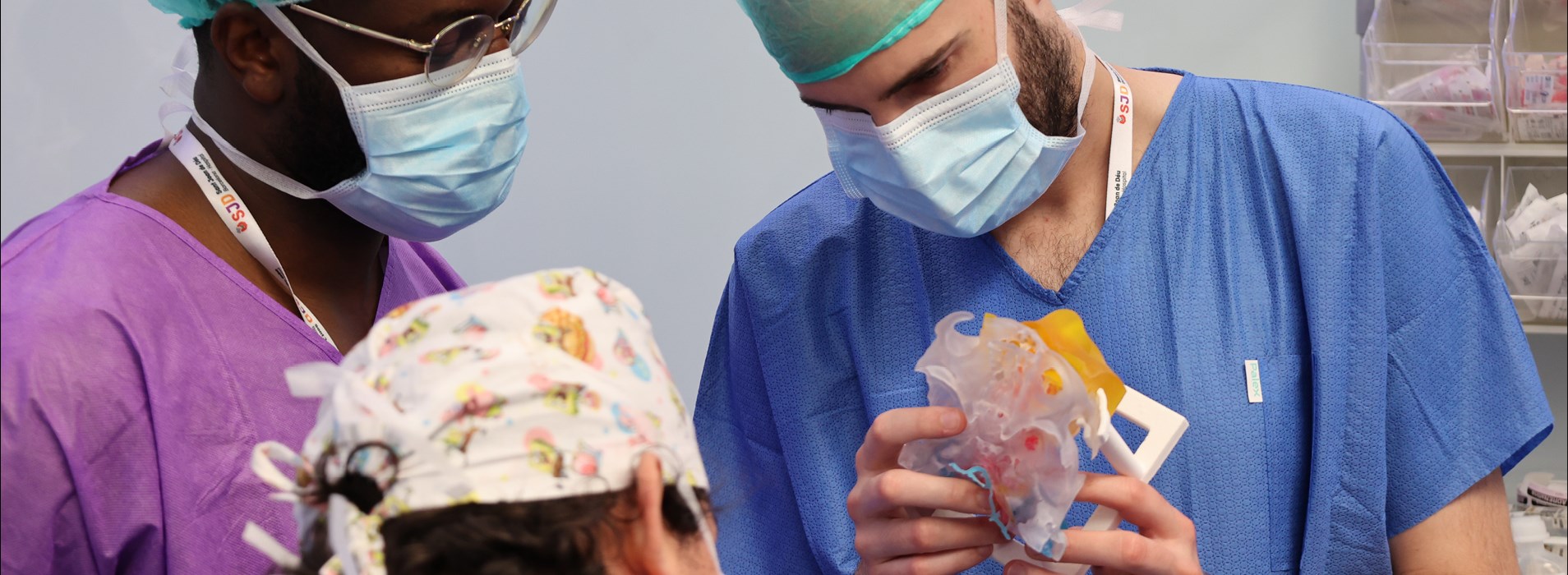 Medical team examining 3d printed medical model